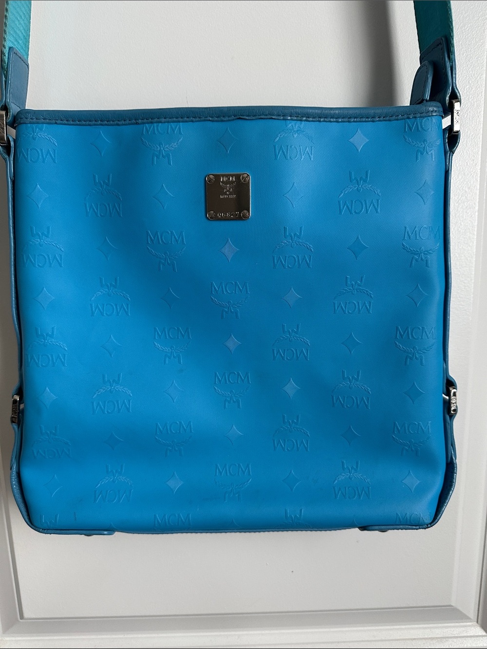 Rare MCM blue crossbody very good condition. Comes with COA.